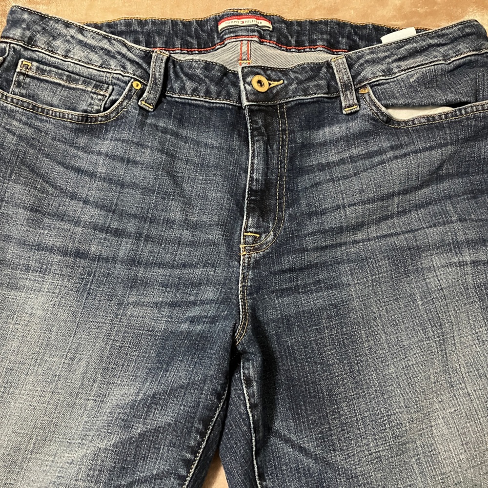Tommy Hilfigerrr, blue jeans with K, and what is the other zipper cuffs